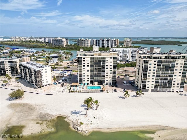 bird's eye view featuring a water view and a view of city