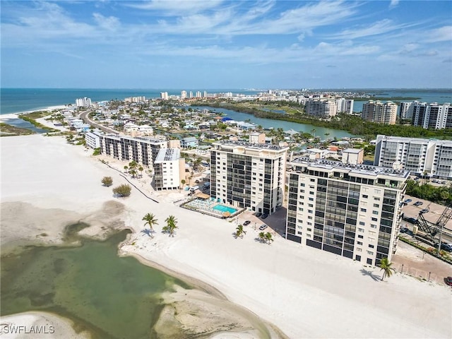 bird's eye view featuring a water view and a city view