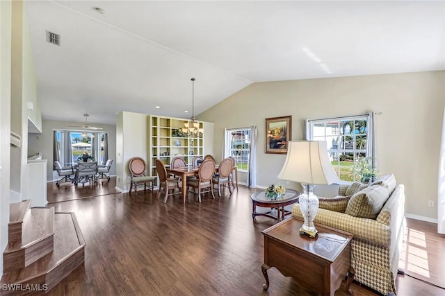 13760 Silver Lake Ct, Fort Myers, FL 33912 - living area with visible vents, wood finished floors, baseboards, a notable chandelier, and lofted ceiling