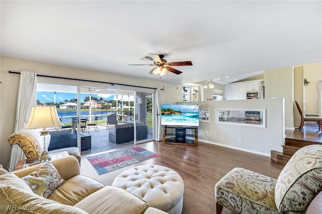 13760 Silver Lake Ct, Fort Myers, FL 33912 - living area featuring baseboards, ceiling fan, visible vents, and wood finished floors