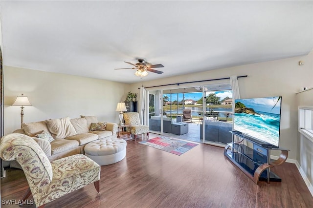 13760 Silver Lake Ct, Fort Myers, FL 33912 - living area featuring a ceiling fan, baseboards, and wood finished floors