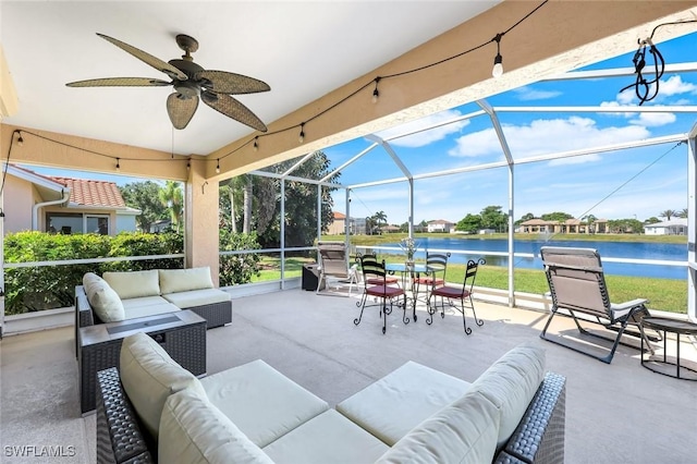 13760 Silver Lake Ct, Fort Myers, FL 33912 - view of patio featuring an outdoor living space, a water view, a ceiling fan, and a lanai