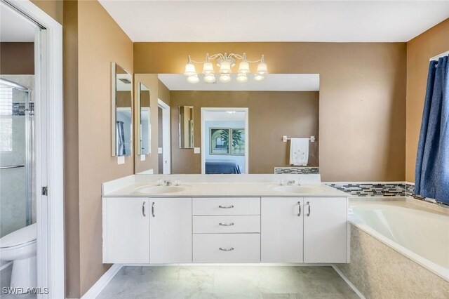 13760 Silver Lake Ct, Fort Myers, FL 33912 - bathroom featuring double vanity, a sink, a bath, and a stall shower