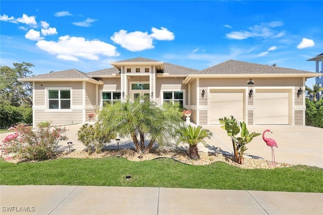 1978 San Marco Rd, Marco Island, FL 34145 - prairie-style home with a garage, concrete driveway, and a front lawn