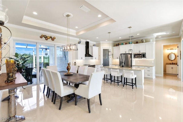 1978 San Marco Rd, Marco Island, FL 34145 - dining space with crown molding, light tile patterned floors, recessed lighting, and a raised ceiling