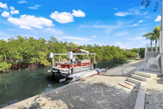 1978 San Marco Rd, Marco Island, FL 34145 - view of yard featuring a dock, boat lift, and a water view