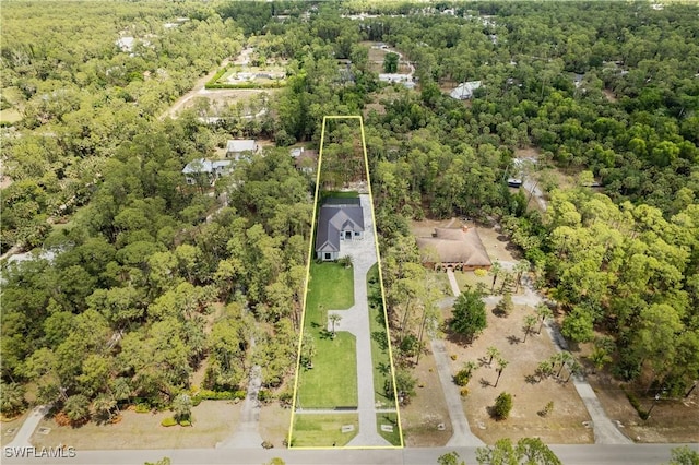 4693 13th Ave SW, Naples, FL 34116 - drone / aerial view featuring a wooded view
