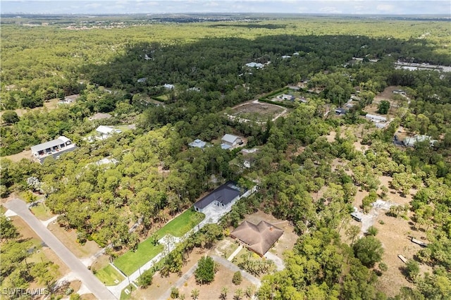 4693 13th Ave SW, Naples, FL 34116 - drone / aerial view with a forest view