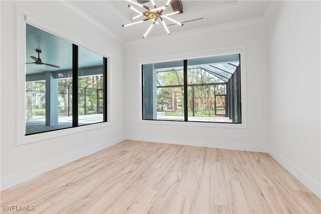 4693 13th Ave SW, Naples, FL 34116 - empty room with baseboards, crown molding, and wood finished floors