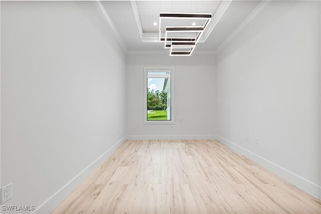 4693 13th Ave SW, Naples, FL 34116 - spare room with a tray ceiling, wood finished floors, baseboards, and ornamental molding