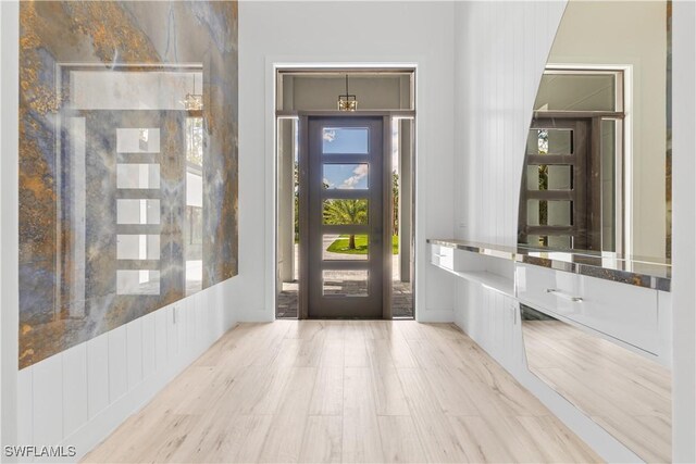 4693 13th Ave SW, Naples, FL 34116 - foyer featuring light wood-style floors