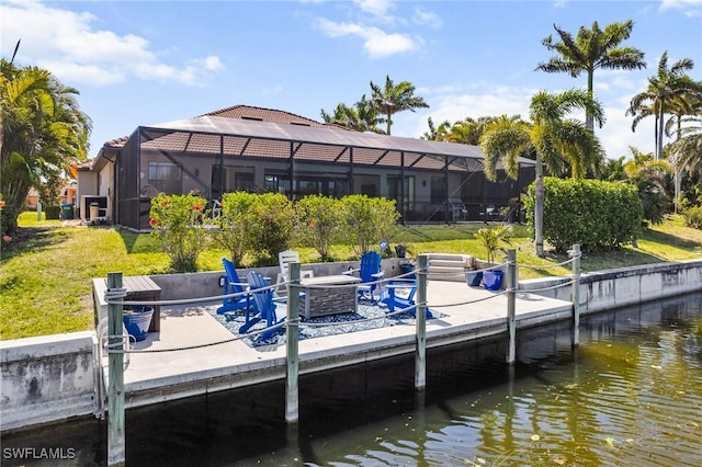 3824 SW 11th Pl, Cape Coral, FL 33914 - view of dock featuring a yard, a water view, and glass enclosure
