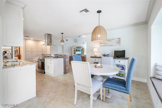 16902 Timberlakes Dr, Fort Myers, FL 33908 - dining space featuring light tile patterned floors, ornamental molding, and baseboards