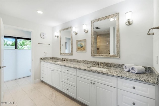 16902 Timberlakes Dr, Fort Myers, FL 33908 - bathroom with double vanity, toilet, recessed lighting, and tile patterned flooring