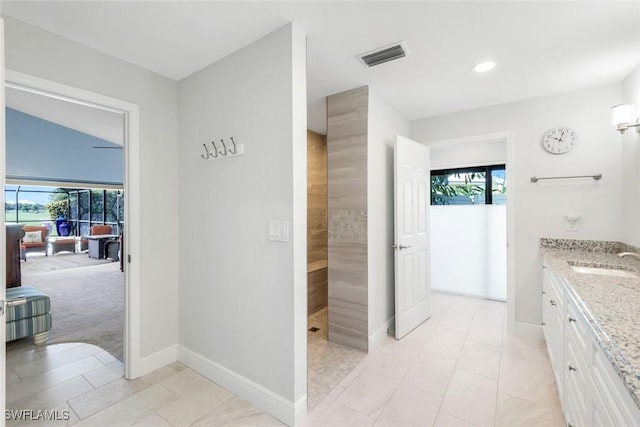 16902 Timberlakes Dr, Fort Myers, FL 33908 - full bath featuring healthy amount of natural light, vanity, baseboards, and recessed lighting