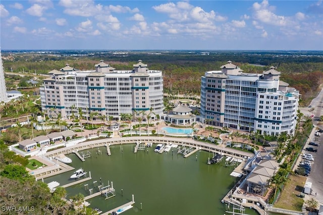 birds eye view of property with a water view