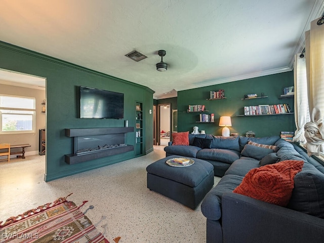 5521 Shaddelee Ln W, Fort Myers, FL 33919 - living room featuring crown molding, a fireplace, speckle patterned floor, and baseboards