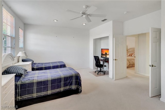 carpeted bedroom featuring ceiling fan, baseboards, and recessed lighting