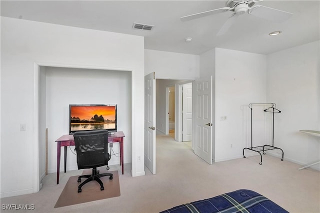 carpeted bedroom with baseboards, a ceiling fan, and visible vents