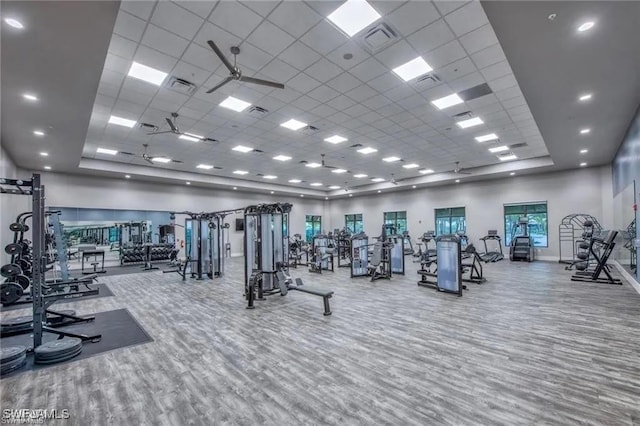 20153 Hartford Blvd, Estero, FL 33928 - exercise room with baseboards, visible vents, a drop ceiling, and wood finished floors