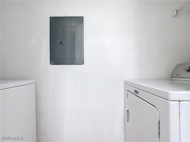 2178 Arbour Walk Cir Unit 2322, Naples, FL 34109 - washroom with electric panel and washing machine and clothes dryer