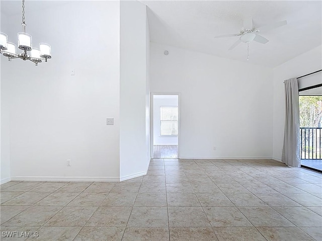 2178 Arbour Walk Cir Unit 2322, Naples, FL 34109 - unfurnished room featuring a chandelier, a ceiling fan, baseboards, and light tile patterned flooring