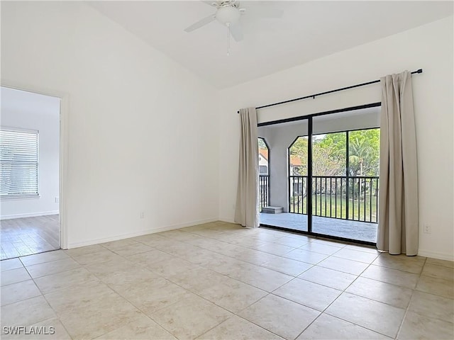2178 Arbour Walk Cir Unit 2322, Naples, FL 34109 - empty room featuring light tile patterned floors, a ceiling fan, high vaulted ceiling, and baseboards