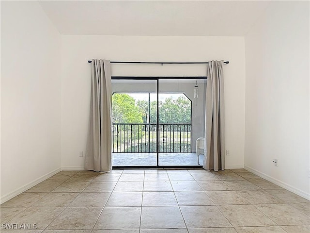 2178 Arbour Walk Cir Unit 2322, Naples, FL 34109 - empty room featuring light tile patterned floors and baseboards