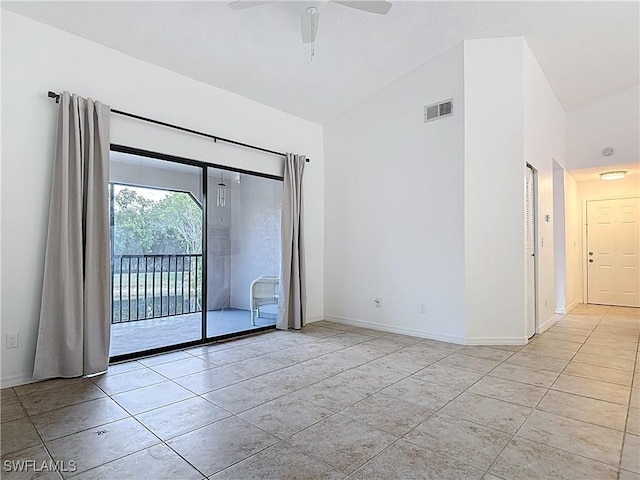2178 Arbour Walk Cir Unit 2322, Naples, FL 34109 - spare room featuring ceiling fan, high vaulted ceiling, baseboards, and tile patterned floors
