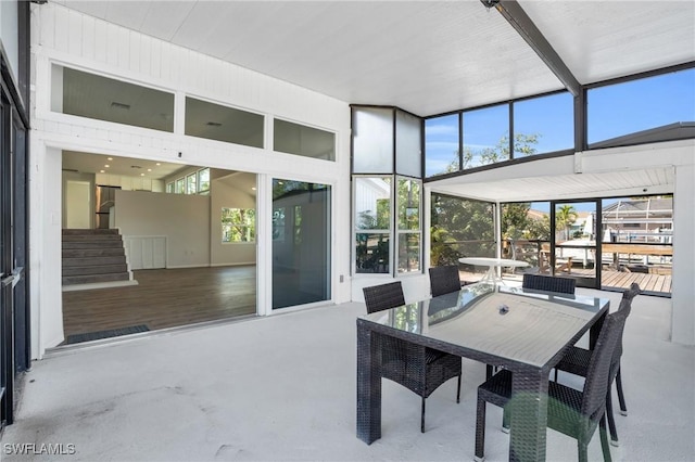 351 Jefferson Ct, Fort Myers Beach, FL 33931 - sunroom featuring outdoor dining area