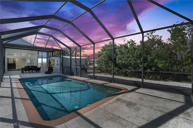 351 Jefferson Ct, Fort Myers Beach, FL 33931 - outdoor pool with a lanai, outdoor dining space, and a patio area