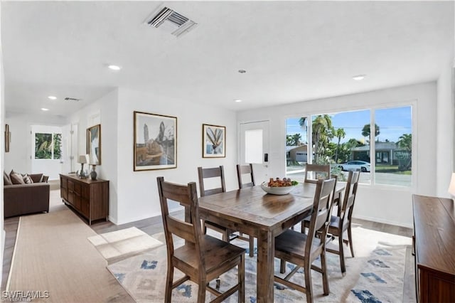 351 Jefferson Ct, Fort Myers Beach, FL 33931 - dining room with baseboards, light wood finished floors, recessed lighting, and visible vents