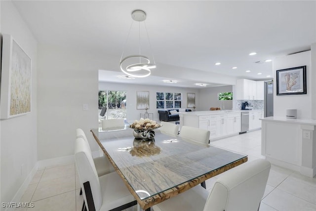 2855 66th St SW, Naples, FL 34105 - dining room featuring light tile patterned flooring, a chandelier, healthy amount of natural light, and recessed lighting