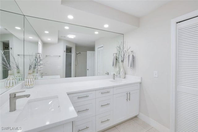 2855 66th St SW, Naples, FL 34105 - full bathroom with a closet, recessed lighting, double vanity, tile patterned floors, and a shower with door