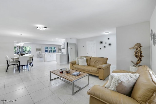 2855 66th St SW, Naples, FL 34105 - living area featuring light tile patterned floors