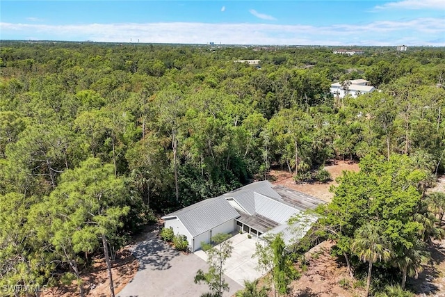2855 66th St SW, Naples, FL 34105 - aerial view of property and surrounding area with a forest