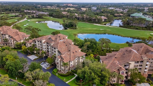 bird's eye view featuring a residential view, a water view, and golf course view
