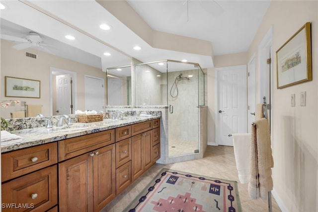 bathroom with visible vents, double vanity, ceiling fan, recessed lighting, and a shower stall