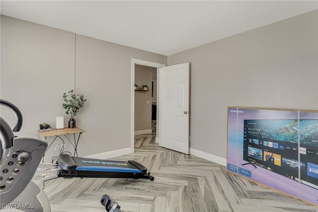 1045 SW Embers Ter, Cape Coral, FL 33991 - exercise area featuring baseboards