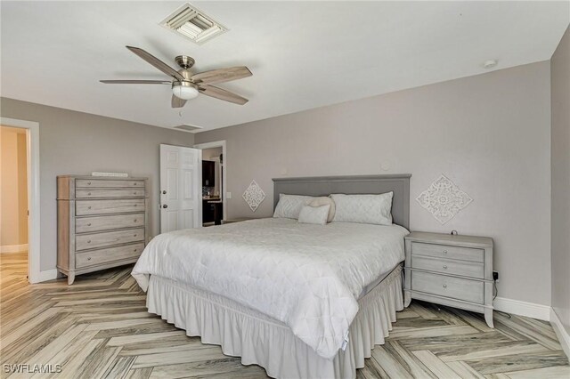 1045 SW Embers Ter, Cape Coral, FL 33991 - bedroom featuring baseboards and ceiling fan
