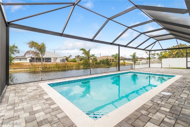 845 SW 15th Ter, Cape Coral, FL 33991 - outdoor pool featuring a water view, a patio area, and a residential view