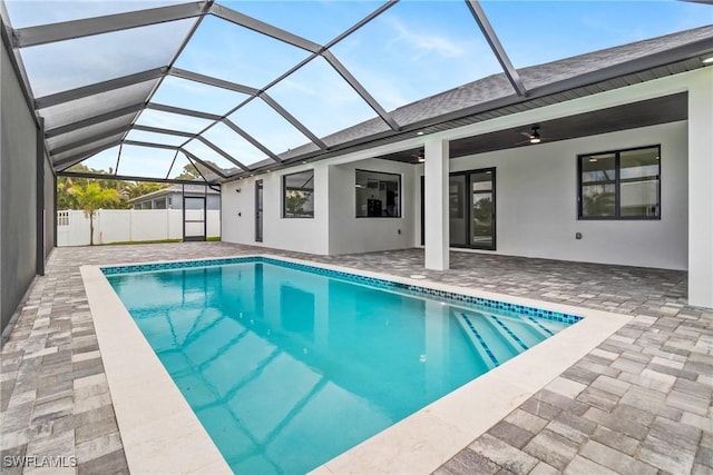 845 SW 15th Ter, Cape Coral, FL 33991 - pool featuring a patio, ceiling fan, a lanai, and fence
