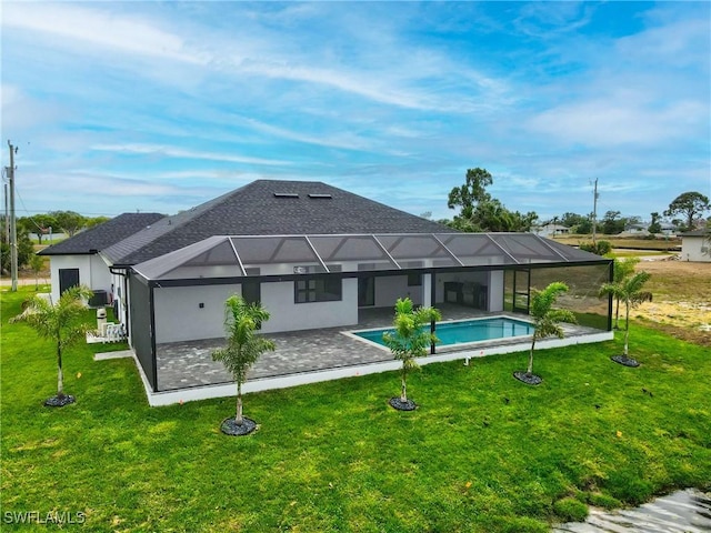 845 SW 15th Ter, Cape Coral, FL 33991 - back of property featuring a yard, a patio area, and an outdoor pool