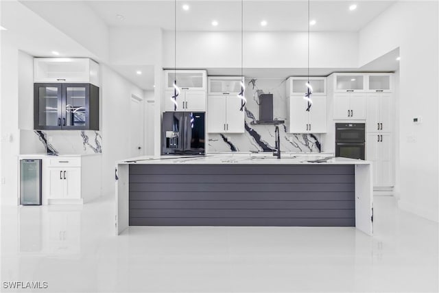845 SW 15th Ter, Cape Coral, FL 33991 - interior space with wine cooler, baseboards, recessed lighting, a sink, and backsplash