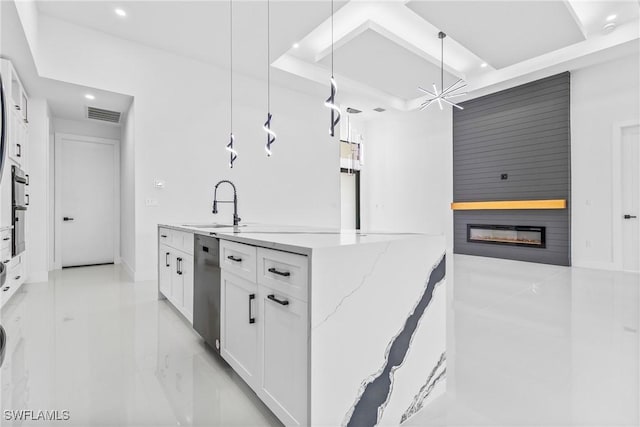 845 SW 15th Ter, Cape Coral, FL 33991 - kitchen with appliances with stainless steel finishes, a sink, a large fireplace, recessed lighting, and visible vents