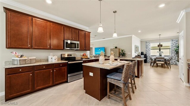 3524 Stormy Creek Ln, Alva, FL 33920 - kitchen featuring crown molding, a peninsula, light tile patterned flooring, light stone countertops, and stainless steel appliances
