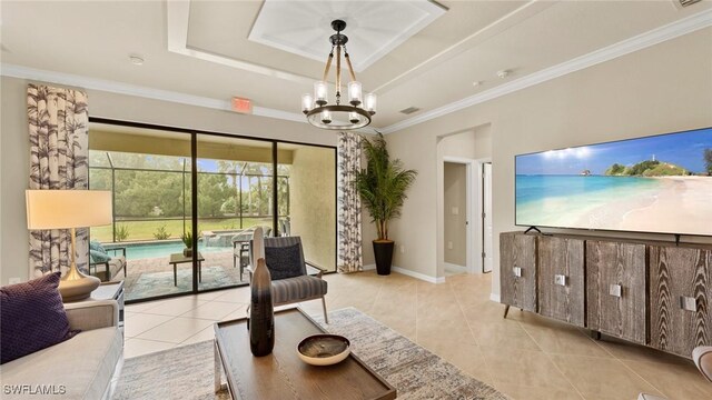 3524 Stormy Creek Ln, Alva, FL 33920 - living area with ornamental molding, baseboards, a raised ceiling, a chandelier, and light tile patterned floors