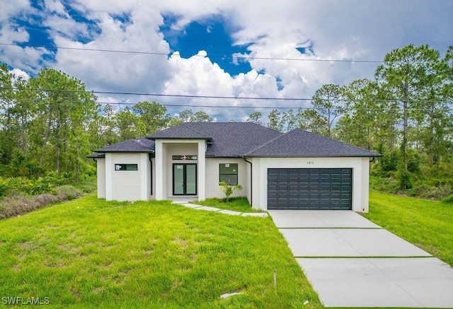 1412 5th Ave, Lehigh Acres, FL 33972 - prairie-style house featuring stucco siding, a garage, a front lawn, concrete driveway, and roof with shingles