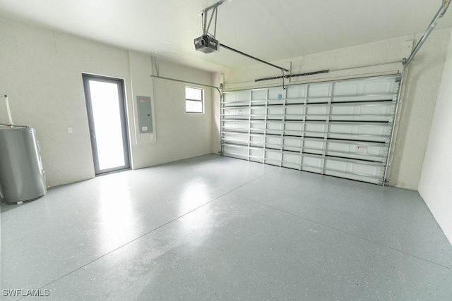 1412 5th Ave, Lehigh Acres, FL 33972 - garage featuring a garage door opener and electric panel