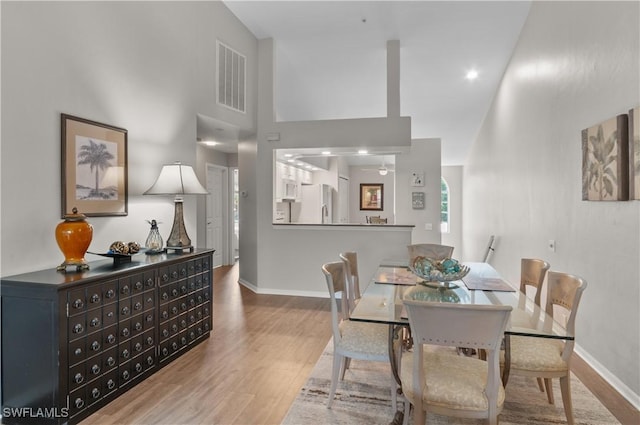 13641 Worthington Way Unit 1612, Bonita Springs, FL 34135 - dining room with baseboards and wood finished floors